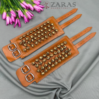Golden Bharatanatyam anklet bells with adjustable straps, Traditional ghungroo for Bharatanatyam performances.