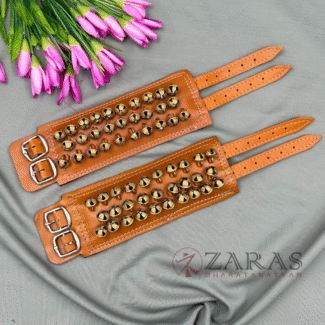Golden Bharatanatyam anklet bells with adjustable straps, Traditional ghungroo for Bharatanatyam performances.